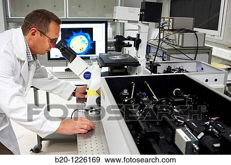 Stock Photo - Nanophotonics laboratory, confocal fluorescence microscope with molecular sensitivity, Materials Physics Center is a joint center of the Spanish Scientific Research Council CSIC and the University of the Basque Country UPV/EHU.. Fotosearch