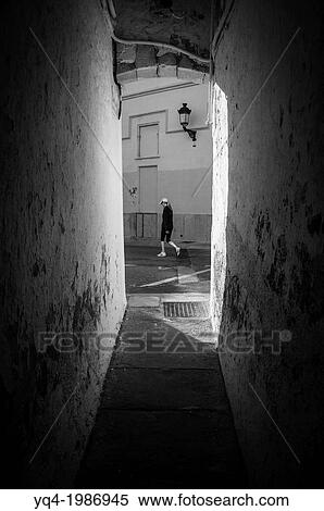 Narrow alley in the vicinity of the church of Sitges, Barcelona, Spain. View Large Photo Image Stock Photography - Narrow alley in the vicinity of the church of Sitges, Barcelona, Spain.. Fotosearch