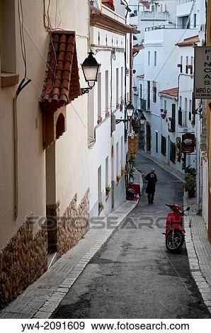 Narrow lane, Sitges, Catalonia, Spain. View Large Photo Image Stock Photo - Narrow lane, Sitges, Catalonia, Spain.. Fotosearch