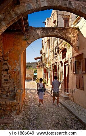 Narrow medieval lanes of Rhodes, Greece UNESCO World Heritage Site View Large Photo Image Stock Photo - Narrow medieval lanes of Rhodes, Greece UNESCO World Heritage Site. Fotosearch