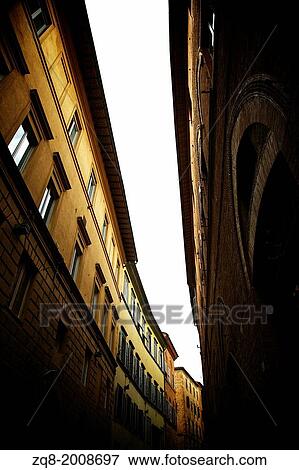 Narrow medieval street in Siena, Italy View Large Photo Image Stock Photo - Narrow medieval street in Siena, Italy. Fotosearch