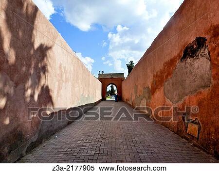 Stock Photography - Narrow road to the Royal Palace of Marrakech, Morocco.. Fotosearch