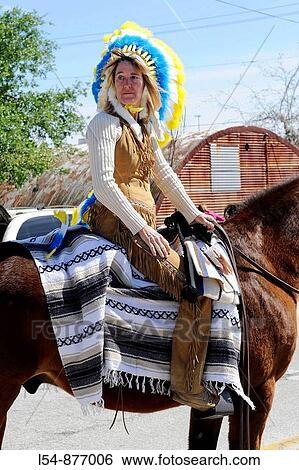 Stock Photograph - Native American on horse in Strawberry Festival Parade Plant City Florida. Fotosearch