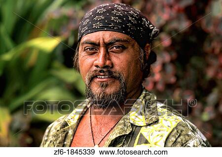 Stock Photo - Native man in colorful clothing Easter Island during Tapati Festival Rapa Nui. Fotosearch