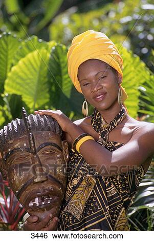 Stock Photograph - Native woman in traditional outfit. Caribbean. Fotosearch