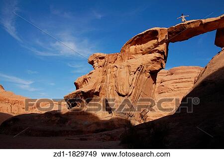 Natural Rock Arch in Wadi Rum View Large Photo Image Stock Photo - Natural Rock Arch in Wadi Rum. Fotosearch