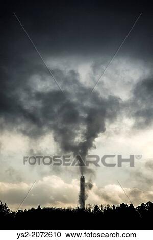 Nature scenery with industry smoke stack polluting the air. Sky with copy space. View Large Photo Image Stock Image - Nature scenery with industry smoke stack polluting the air. Sky with copy space.. Fotosearch
