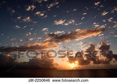 Nature showing Sunrise in Carribbean. View Large Photo Image Stock Photograph - Nature showing Sunrise in Carribbean.. Fotosearch