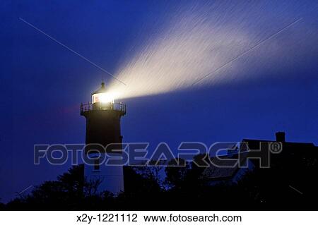 Nauset Light shines during a stormy night, Cape Cod National Seashore, Eastham, Cape Cod, MA, USA View Large Photo Image Stock Image - Nauset Light shines during a stormy night, Cape Cod National Seashore, Eastham, Cape Cod, MA, USA. Fotosearch
