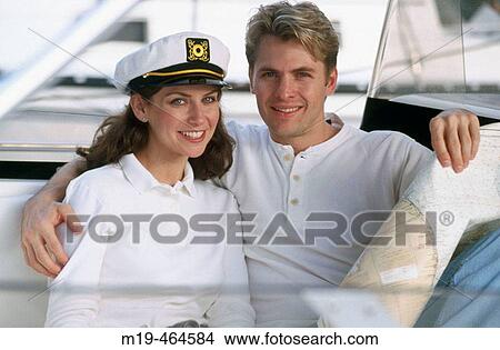 Picture - nautical couple on a boat. Fotosearch
