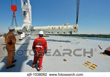 Naval operations of unloading and loading of petroleum components exceptional size View Large Photo Image Stock Image - Naval operations of unloading and loading of petroleum components exceptional size. Fotosearch