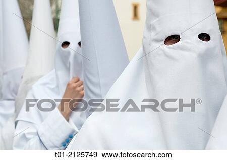 Nazarenes in the Holy Week in Seville. View Large Photo Image Stock Photo - Nazarenes in the Holy Week in Seville.. Fotosearch