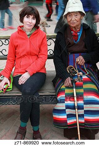 Nepal, Kathmandu Valley, Bodhnath, tibetan pilgrim, western tourist View Large Photo Image Stock Image - Nepal, Kathmandu Valley, Bodhnath, tibetan pilgrim, western tourist. Fotosearch