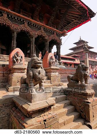 Stock Image - Nepal. Patan, an historic town in the Kathmandu Valley. Scenes in Durbar Square.. Fotosearch