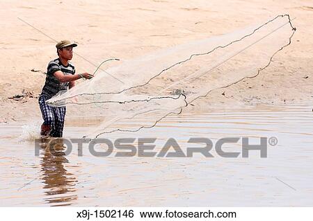 Net fishing, Pueh village, Lundu Division, Sarawak, Malaysia, Borneo View Large Photo Image Stock Photograph - Net fishing, Pueh village, Lundu Division, Sarawak, Malaysia, Borneo. Fotosearch