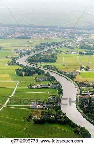 Netherlands. Amsterdam. Channel near Amsterdam. View Large Photo Image Stock Photo - Netherlands. Amsterdam. Channel near Amsterdam.. Fotosearch