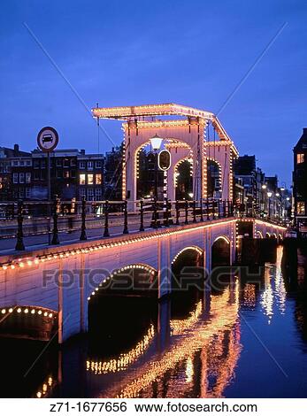 Stock Photograph - Netherlands Amsterdam Magere Brug Sleder Bridge. Fotosearch