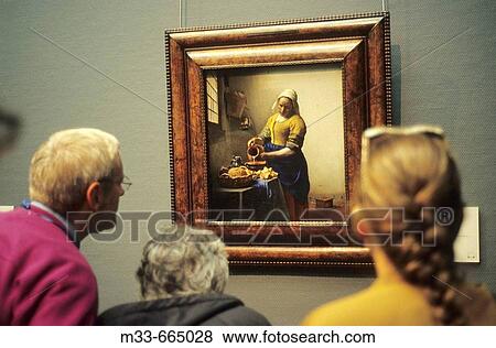 Netherlands - North Holland - Amsterdam - The Milkmaid ( De Melkmeid ), painting by Johannes Vermeer in Rijksmuseum. View Large Photo Image Stock Photo - Netherlands - North Holland - Amsterdam - The Milkmaid ( De Melkmeid ), painting by Johannes Vermeer in Rijksmuseum.. Fotosearch