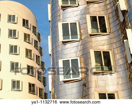 Stock Photograph - Neuer Zolholf buildings offices by the architect Frank Gehry, Medienhafen, Dusseldorf, Germany, Europe. Fotosearch