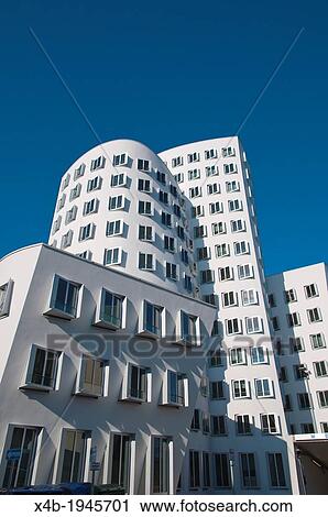 Stock Image - Neuer Zollhof buildings by F Gehry Medienhafen the Media Harbour area Dusseldorf city Germany Europe.. Fotosearch