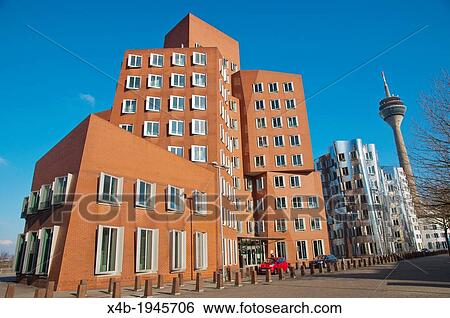 Stock Photograph - Neuer Zollhof buildings by F Gehry Medienhafen the Media Harbour area Dusseldorf city Germany Europe.. Fotosearch