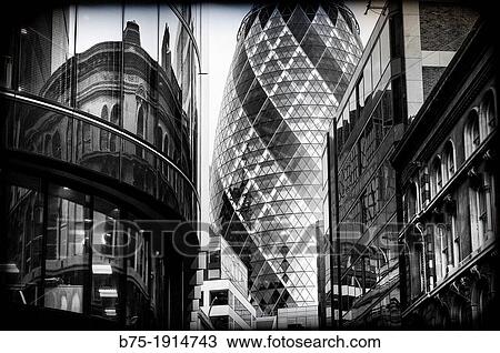 new architecture with Gherkin building designed by Foster and Partners on the background, London, England, UK View Large Photo Image Stock Image - new architecture with Gherkin building designed by Foster and Partners on the background, London, England, UK. Fotosearch