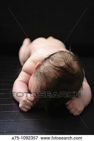 Stock Photo - New born baby. Fotosearch