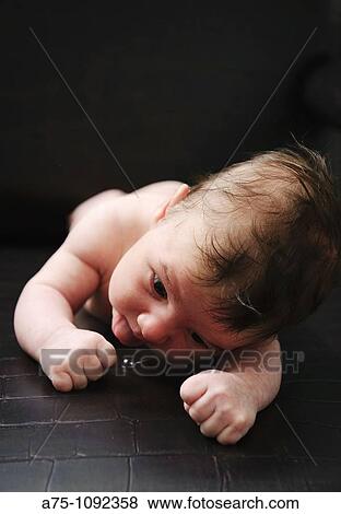 New born baby View Large Photo Image Stock Photo - New born baby. Fotosearch