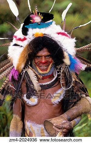 NEW GUINEA HIGHLANDS, NEAR TARI, HULI TRIBE, PORTRAIT OF MAN. View Large Photo Image Stock Photograph - NEW GUINEA HIGHLANDS, NEAR TARI, HULI TRIBE, PORTRAIT OF MAN.. Fotosearch