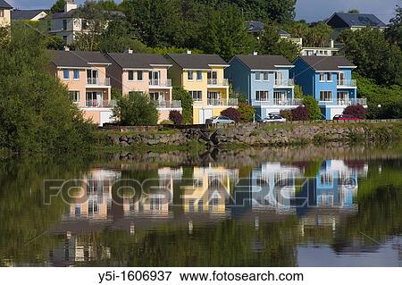 New housing along the River Laune, Killorglin, County Kerry, Ireland View Large Photo Image Stock Photo - New housing along the River Laune, Killorglin, County Kerry, Ireland. Fotosearch