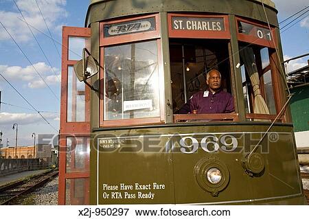 Stock Photo - New Orleans, Louisiana - Lawrence Galloway drives a streetcar. Fotosearch