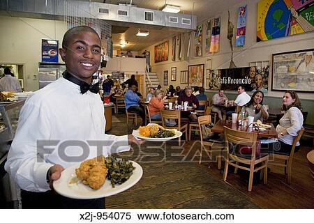 Stock Photography - New Orleans, Louisiana - Young people serve lunch at Caf? Reconcile, a project of the nonprofit Reconcile New Orleans The program was begun in 1996 by local religious leaders It teaches at risk youth the life skills and work skills needed for careers in. Fotosearch
