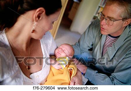 New parents with infant View Large Photo Image Picture - New parents with infant. Fotosearch
