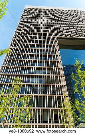 Stock Image - New Poly Plaza, the world's largest glass facade, by Skidmore Owings & Merrill, 2007, Dongcheng District, Beijing, China, Asia. Fotosearch