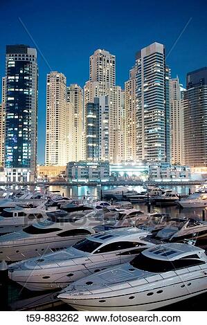 New Quarter Dubai Marina at dusk with yachting port, Dubai, United Arabian Emirates View Large Photo Image Stock Image - New Quarter Dubai Marina at dusk with yachting port, Dubai, United Arabian Emirates. Fotosearch