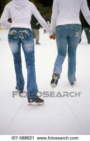 New York City Central Park ice-skating rink. 23 & 25 year old women. View Large Photo Image Stock Image - New York City Central Park ice-skating rink. 23 & 25 year old women.. Fotosearch