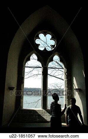 New York City, couple talking at a window of The Cloisters, Upper Manhattan View Large Photo Image Stock Photo - New York City, couple talking at a window of The Cloisters, Upper Manhattan. Fotosearch
