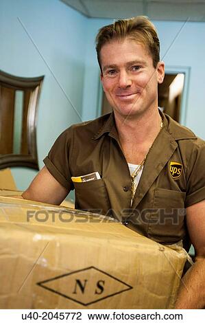 Stock Image - New York City delivery man.. Fotosearch