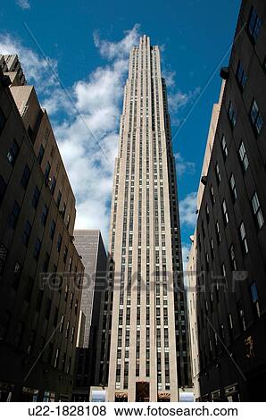 New York City, the 75 Rockefeller Plaza, also known as the Esso Building and Time Warner Building, at the Rockefeller Center, Manhattan View Large Photo Image Stock Photo - New York City, the 75 Rockefeller Plaza, also known as the Esso Building and Time Warner Building, at the Rockefeller Center, Manhattan. Fotosearch
