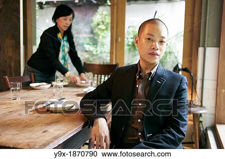 Stock Image - New York fashion designer Jason Wu visits his favorite places in Taipei Portrait taken at restaurant Shi Zhi Tang, known for its traditional Taiwanese atmosphere and cuisine. Fotosearch
