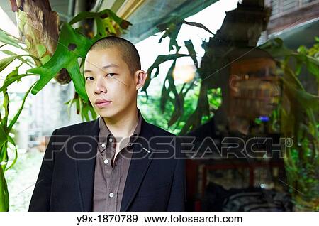 New York fashion designer Jason Wu visits his favorite places in Taipei Portrait taken at restaurant Shi Zhi Tang, known for its traditional Taiwanese atmosphere and cuisine View Large Photo Image Stock Photo - New York fashion designer Jason Wu visits his favorite places in Taipei Portrait taken at restaurant Shi Zhi Tang, known for its traditional Taiwanese atmosphere and cuisine. Fotosearch