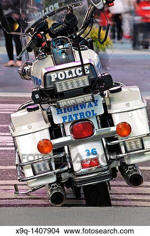 New York Police Department Harley-Davidson Electra Glide motorcycles parked in Times Square, 42nd Street, Theater District, and elegant and popular tourist attraction, 2011 View Large Photo Image Picture - New York Police Department Harley-Davidson Electra Glide motorcycles parked in Times Square, 42nd Street, Theater District, and elegant and popular tourist attraction, 2011. Fotosearch