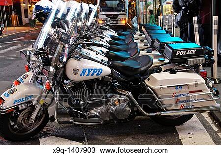 New York Police Department Harley-Davidson Electra Glide motorcycles parked in Times Square, 42nd Street, Theater District, and elegant and popular tourist attraction, 2011 View Large Photo Image Stock Image - New York Police Department Harley-Davidson Electra Glide motorcycles parked in Times Square, 42nd Street, Theater District, and elegant and popular tourist attraction, 2011. Fotosearch