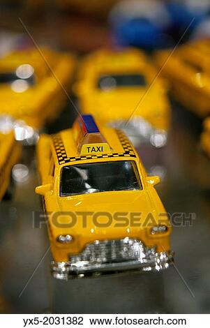 New York taxi toy car displayed in a souvenir store. View Large Photo Image Stock Image - New York taxi toy car displayed in a souvenir store.. Fotosearch