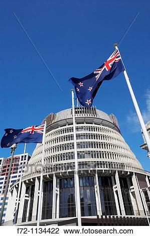 New Zealand flags flying in front of The Beehive, Parliament Buildings View Large Photo Image Stock Image - New Zealand flags flying in front of The Beehive, Parliament Buildings. Fotosearch