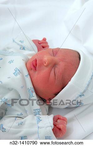 Newborn baby boy at hospital nursery, 1 day old View Large Photo Image Stock Image - Newborn baby boy at hospital nursery, 1 day old. Fotosearch