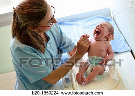 Picture - Newborn, Nurse Care, Maternity, Donostia Hospital, San Sebastian, Donostia, Gipuzkoa, Basque Country, Spain. Fotosearch