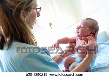 Stock Photo - Newborn, Nurse Care, Maternity, Donostia Hospital, San Sebastian, Donostia, Gipuzkoa, Basque Country, Spain. Fotosearch