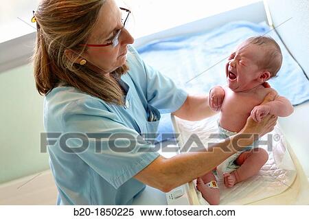 Stock Photography - Newborn, Nurse Care, Maternity, Donostia Hospital, San Sebastian, Donostia, Gipuzkoa, Basque Country, Spain. Fotosearch