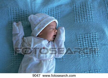 Newborn on blanket View Large Photo Image Stock Photo - Newborn on blanket. Fotosearch
